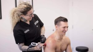 Photo of a client undergoing shockwave therapy. If you’re looking for pain relief that doesn’t require medication or surgery, chiropractic care in Jupiter, FL, can help you feel like yourself again in a natural, effective way.