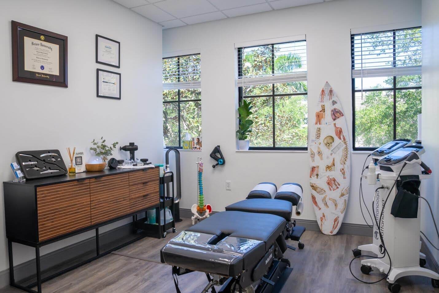 Image of a chiropractic table in a therapy office. Injuries and discomfort seem to present themselves at the least convenient times. A Jupiter chiropractor who offers concierge services can meet your needs, even after hours.