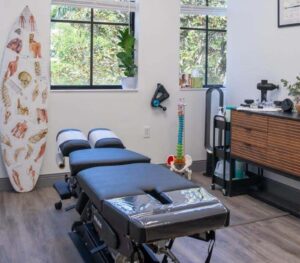 Close-up picture of a chiropractic care table. Are you dealing with daily elbow pain? Even if you don’t play sports, it could be tennis elbow. Meet with an experienced Jupiter chiropractor for natural and effective elbow pain treatment.
